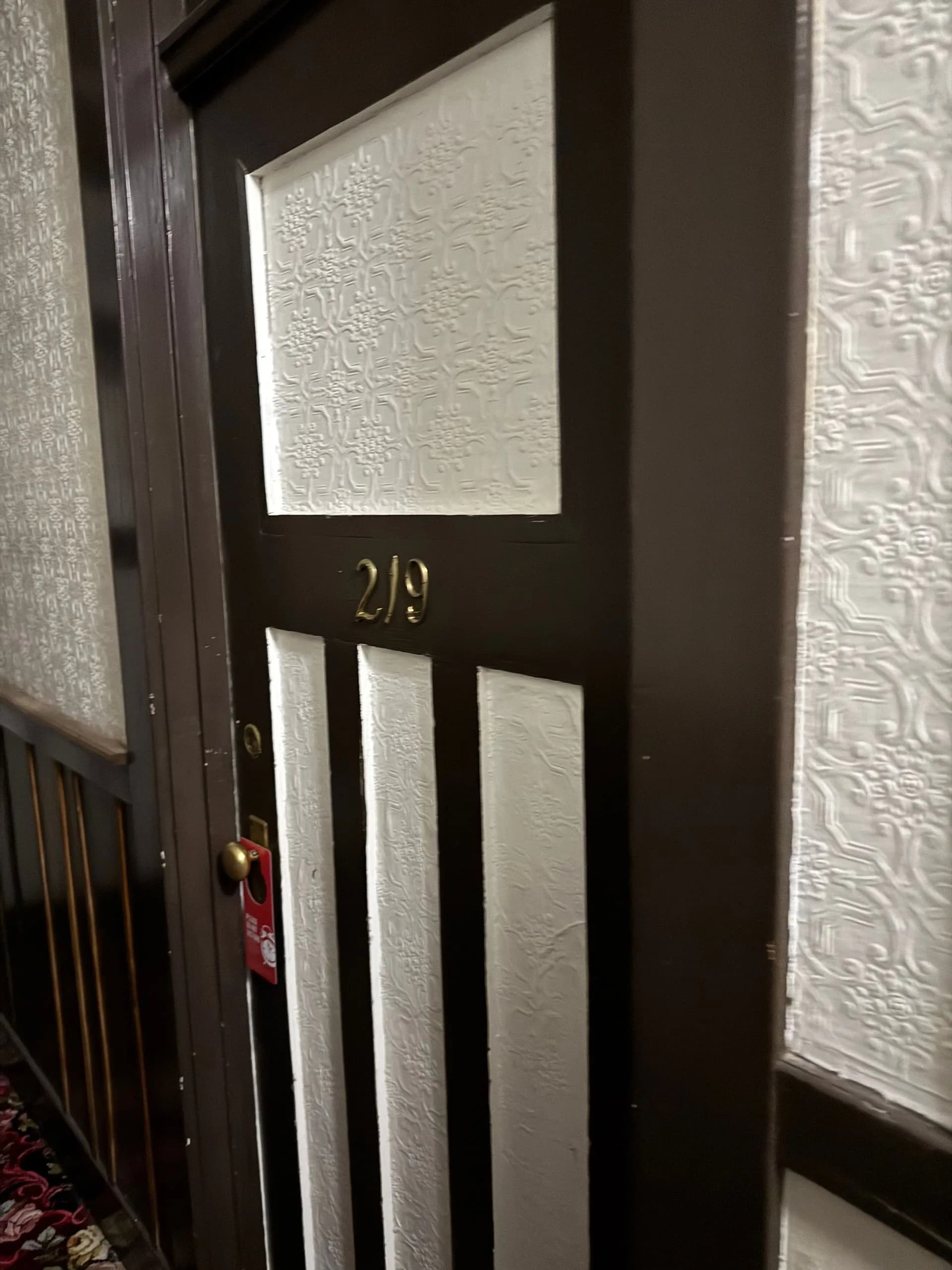 Room 219 at the Alaskan Hotel with a Do Not Disturb sign