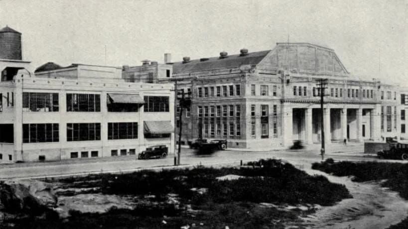 A black and white photo of a large building