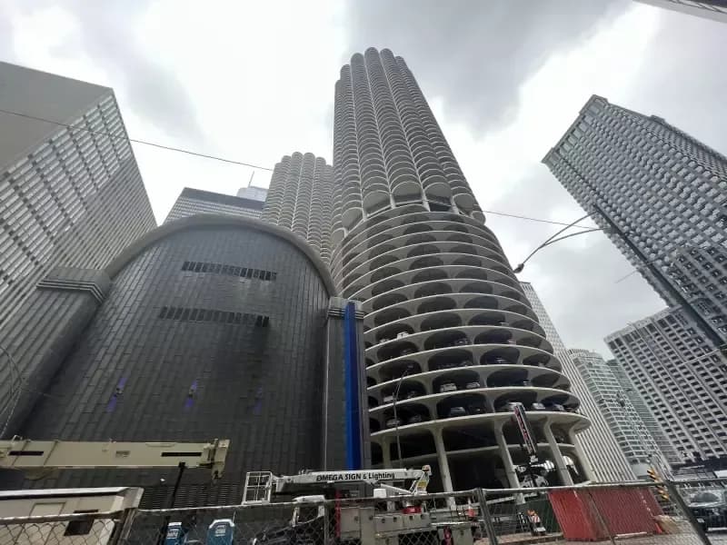 Looking up at a very tall building in a city
