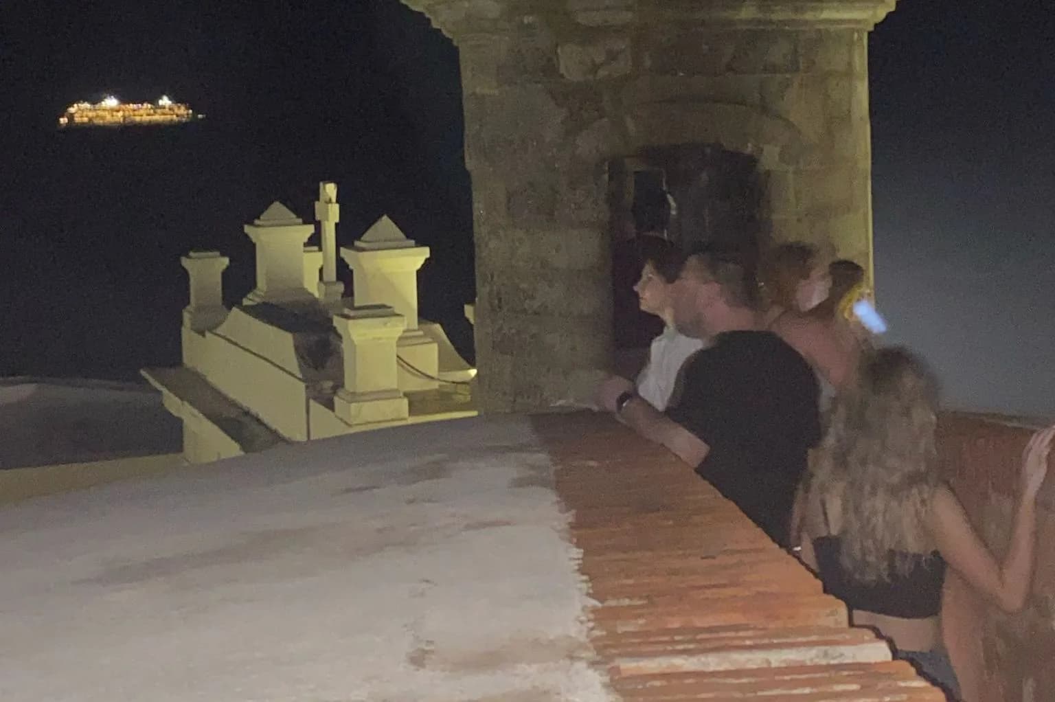 Ghost tour guests at La Garita del Diablo overlook