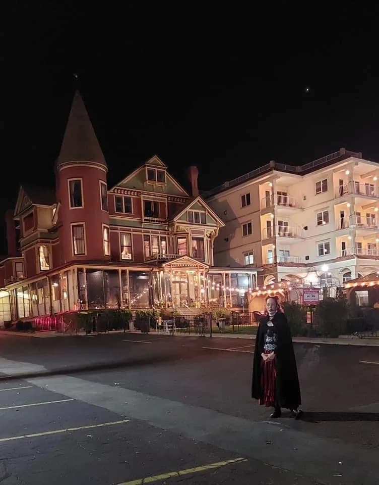 Maxwell Mansion in Lake Geneva lit up at night