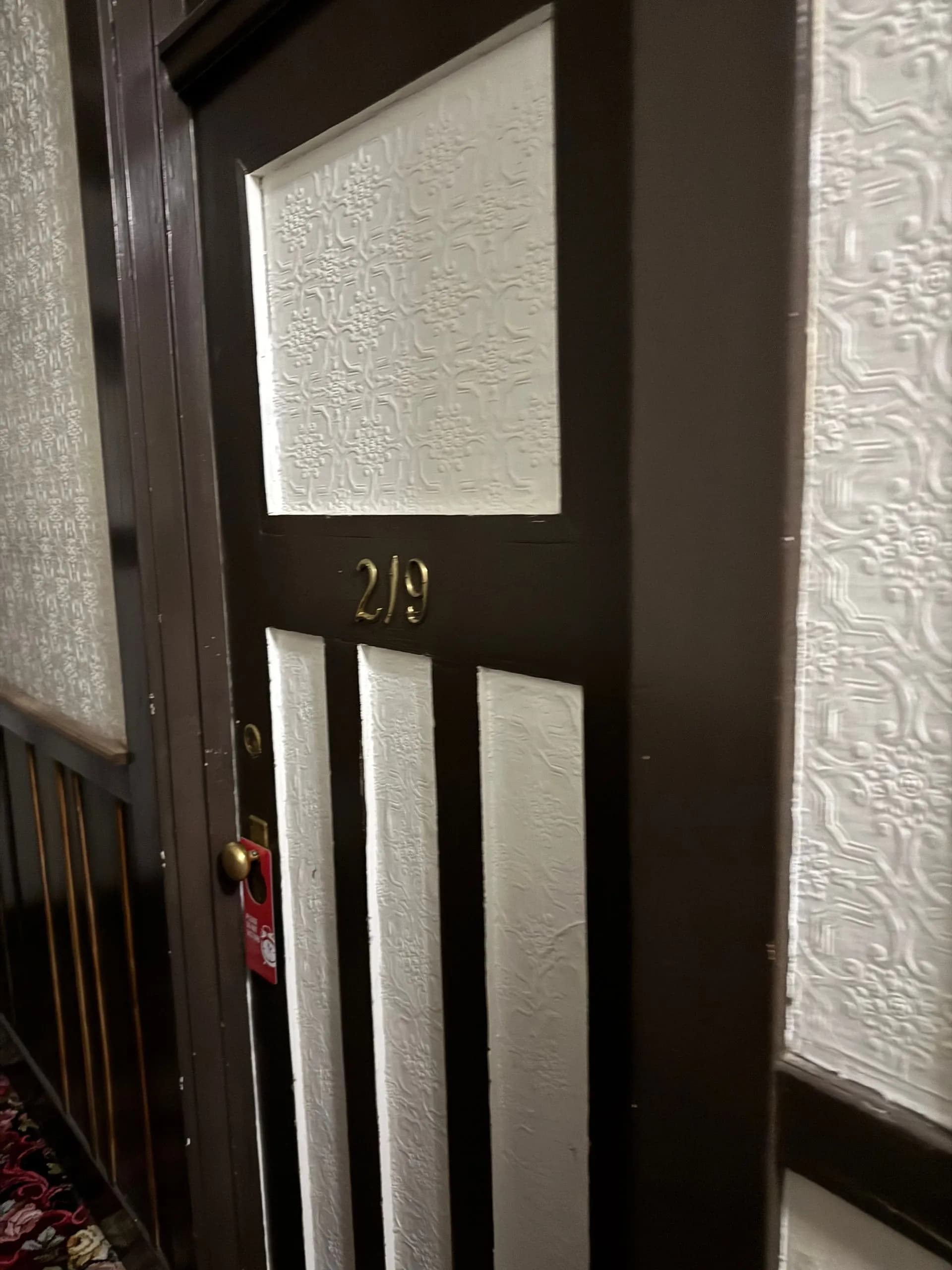 Room 219 at the haunted Alaskan Hotel and Bar with a Do Not Disturb sign