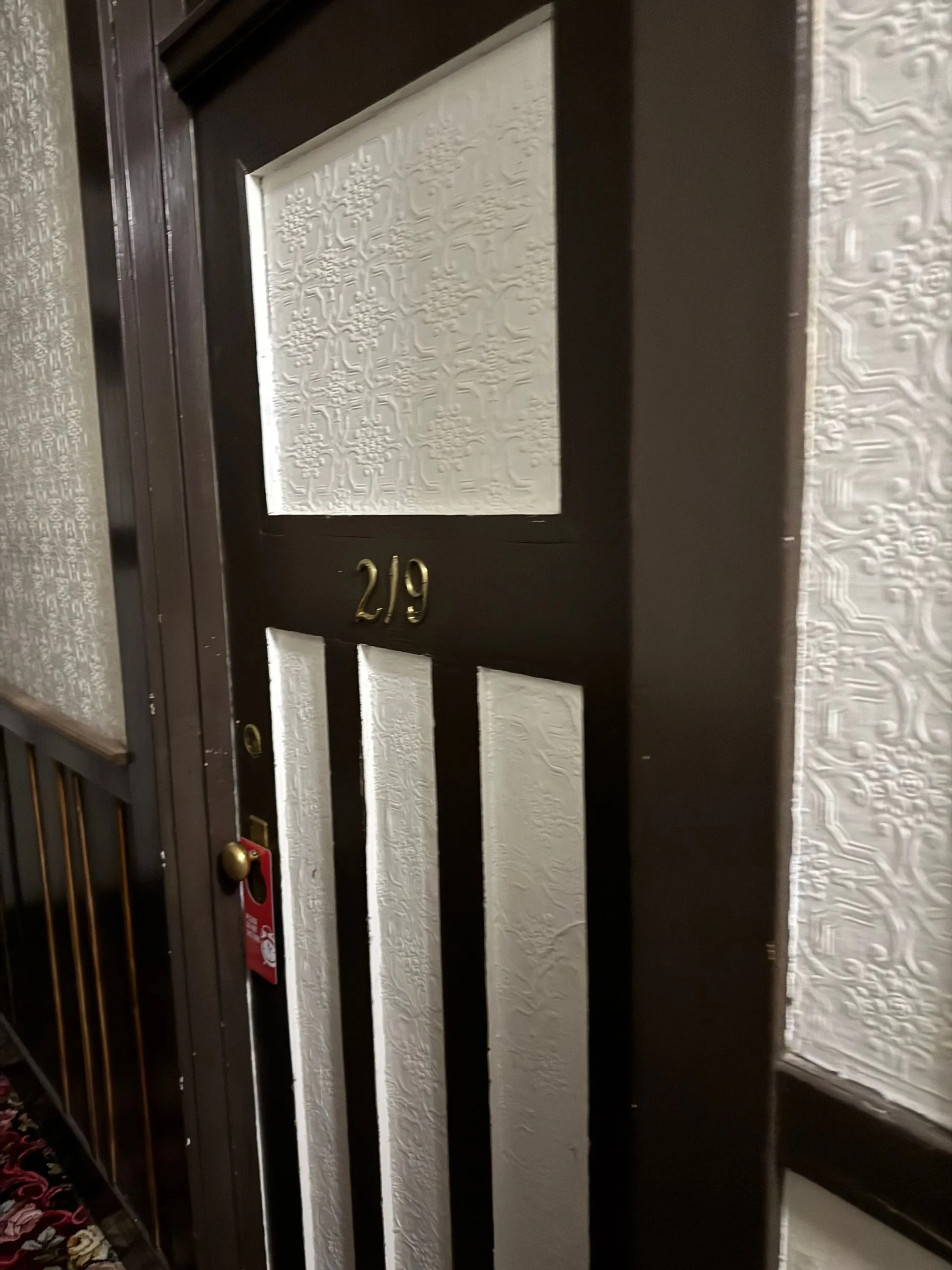 Room 219 at the haunted Alaskan Hotel and Bar with a Do Not Disturb sign