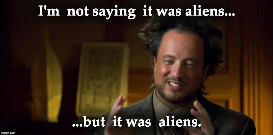 Man with wild hair and knowing smile, saying, 