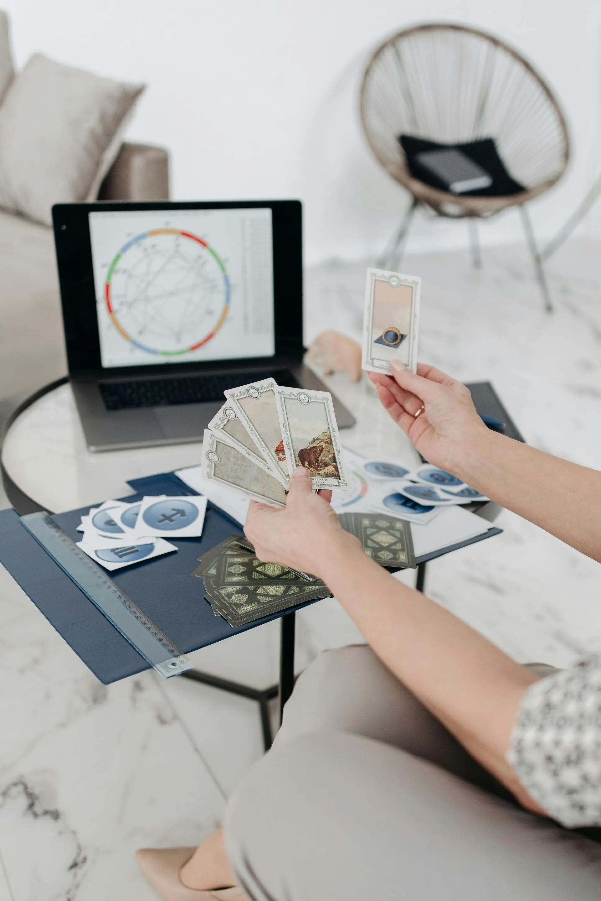 Reading a tarot deck in front of computer