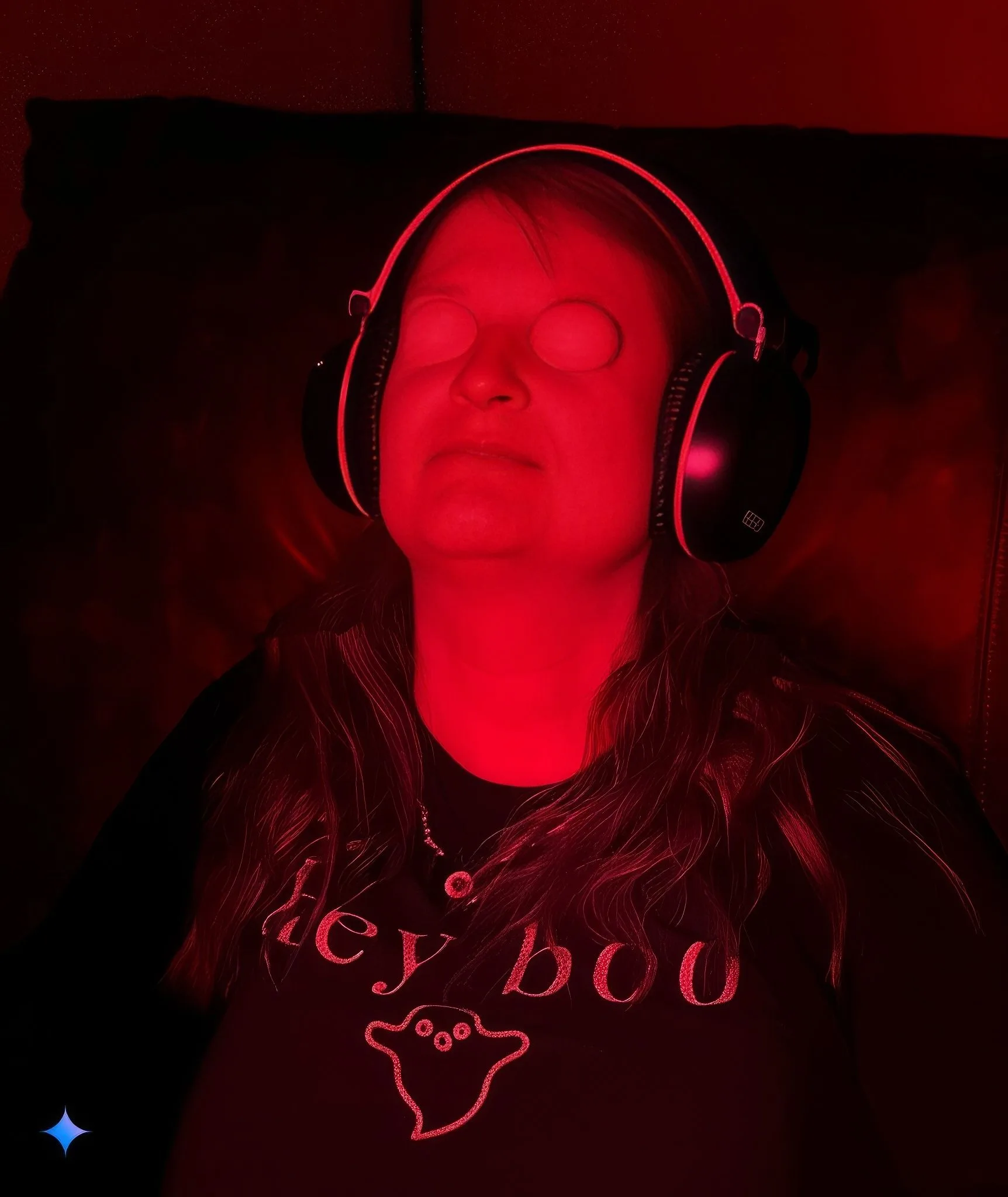 My sister Allison Jornlin with ping pong balls over her eyes, doing a Ganzfeld experiment