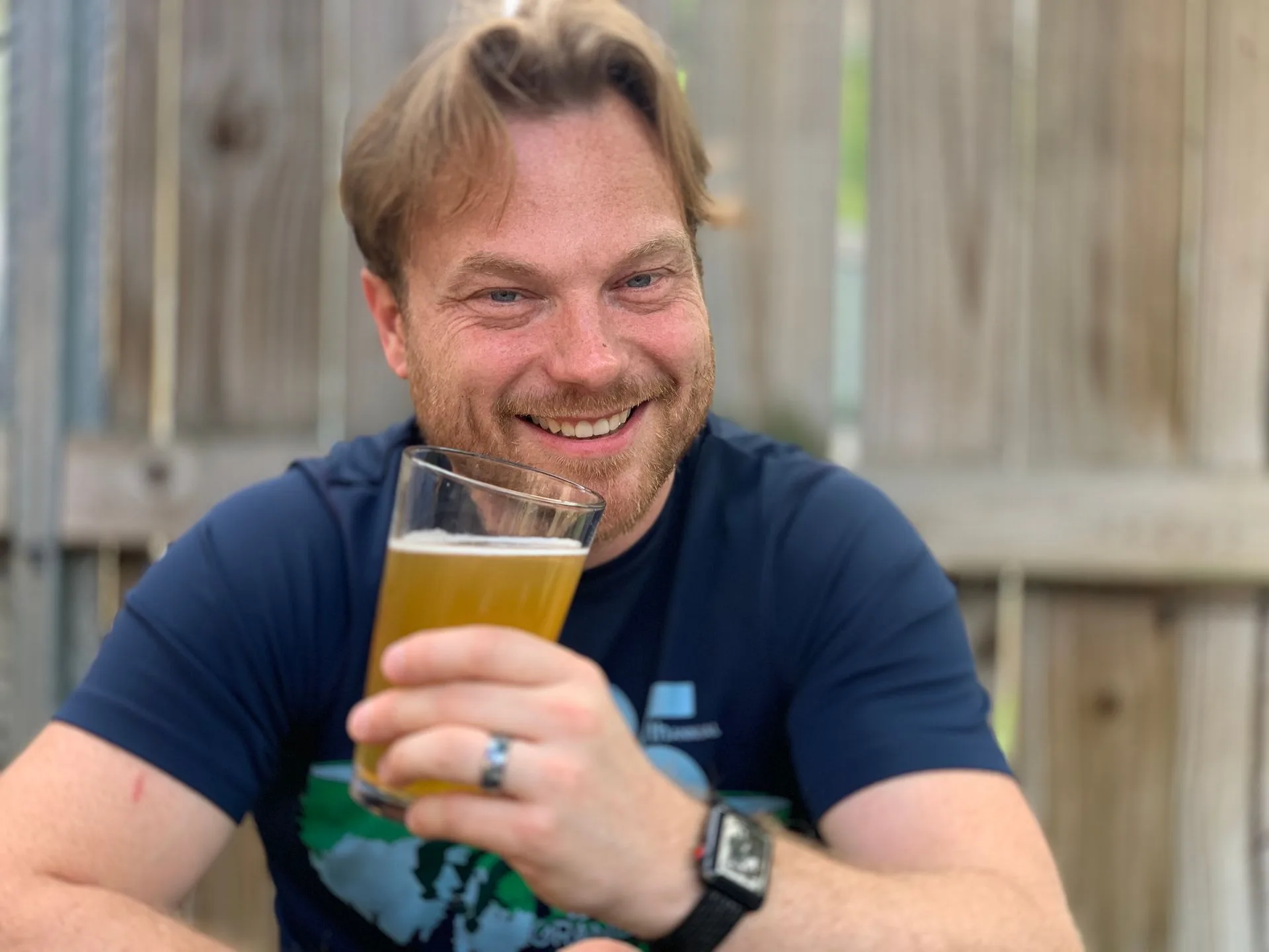 Mike Huberty drinking a cold beer at haunted Mickey's Tavern in Madison, Wisconsin