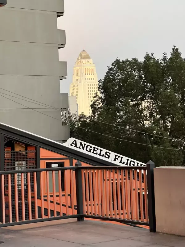A balcony with a sign that says angels flight