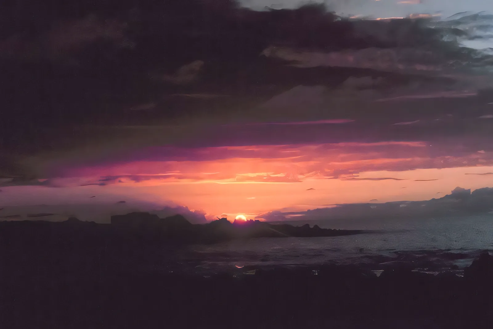 A sunset over a body of water with purple clouds