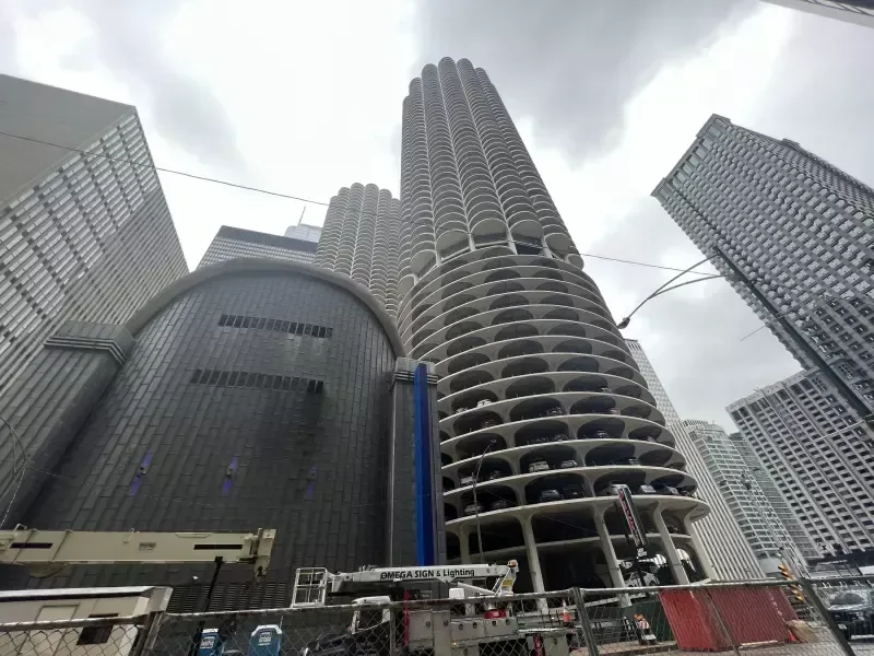 Looking up at a very tall building in a city