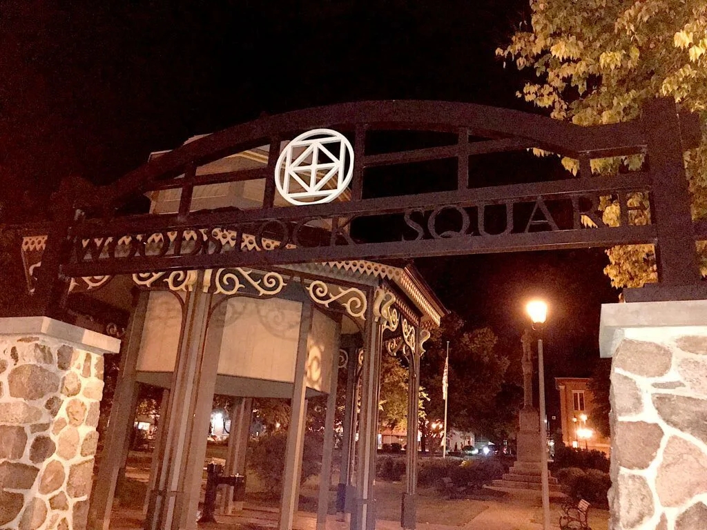 Woodstock Square at dusk — Old Courthouse and Victorian storefronts