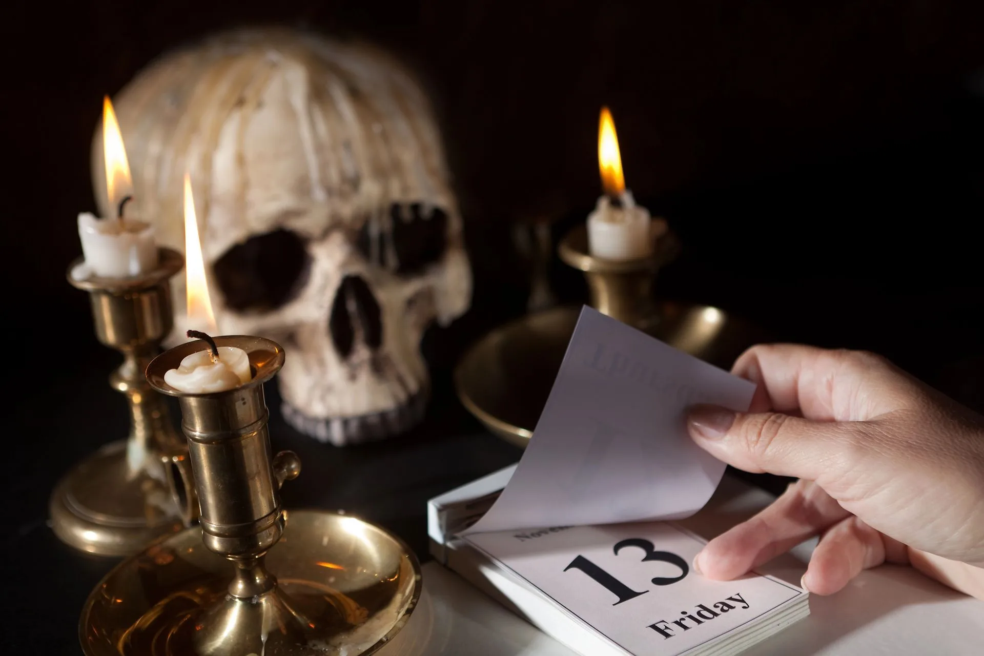 a skull and candle on friday the 13th